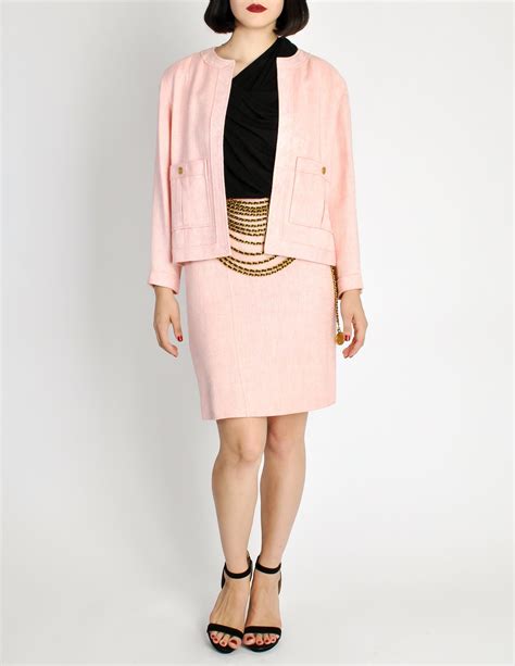 chanel ponk|Chanel pink tweed suit.